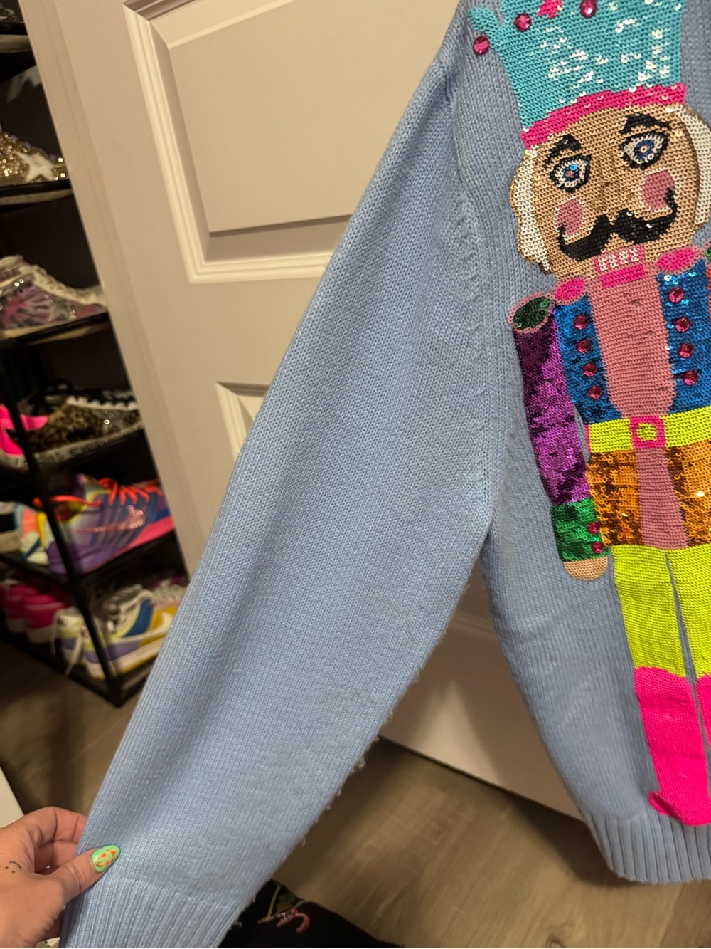 Light Blue Cardigan Sweater with Colorful Nutcracker Sequin Design - Picture 5 of 9